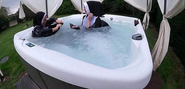  Two Naughty Nuns Get Wet In The Hot Tub